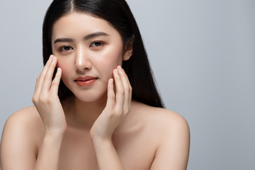 Portrait of beautiful young asian woman clean fresh bare skin concept. Asian girl beauty face skincare and health wellness, Facial treatment, Perfect skin, Natural make up. Isolated on gray background