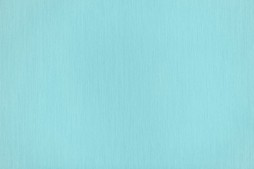 Trendy light blue colored low contrast paper textured background for your design or product.