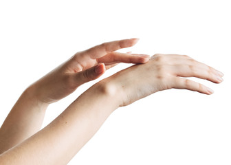 Beautiful women hands applying cream