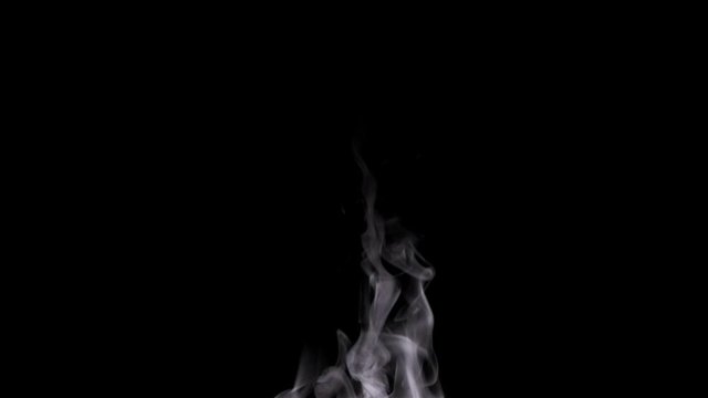 Trickle of Steam Slowly Rising from the Cup. White steam rises light, graceful twists on a black background. Slow motion. Footage is perfect for the layer with different blending modes.