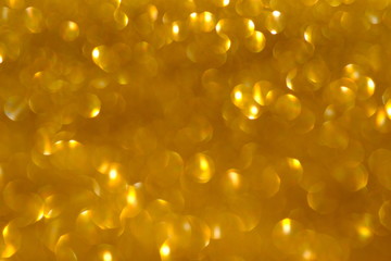 abstract golden background with bokeh lights