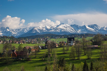 Panorama of snowy Tatra mountains and Podhale village Bukowina Tatrzanska, Malopolskie, Poland
