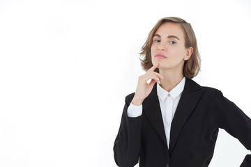A beautiful business woman in a suit is thinking with a happy face on a white background in the concept of business success and career progress.