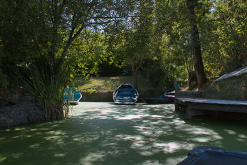 Boats in Park Marais Poitevin near Maillezais in France,Europe