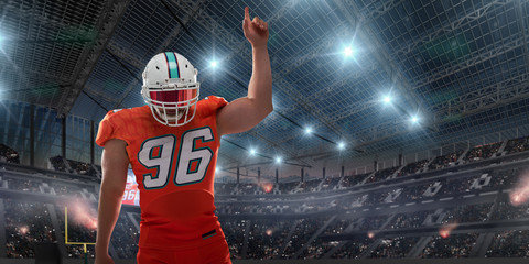 American football players in professional sport stadium.