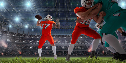 American football players in professional sport stadium.
