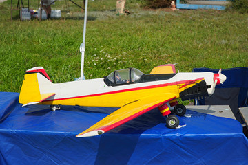 The model airplane is handcrafted with a propeller on radio control