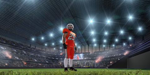 Fototapeta na wymiar American football players in professional sport stadium.