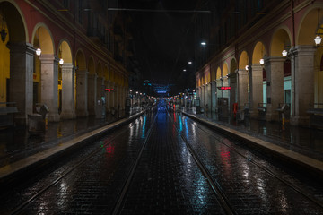 Fototapeta na wymiar Rainy streets of Nice in the evening