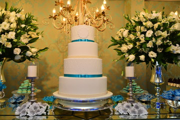 15 years birthday cake in the party hall, candy and cake table,   condensed milk candy balls, candy balls