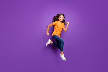 Fototapeta na wymiar Full length body size view of her she nice attractive lovely glad active cheerful cheery wavy-haired girl jumping running spring season isolated over lilac purple violet pastel color background