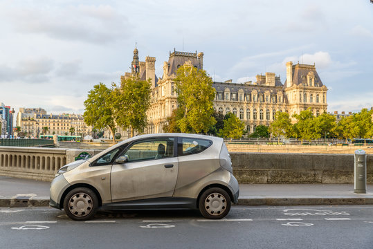 PARIS, FRANCE - CIRCA AUGUST 2015: An Autolib' is parked at an Autolib' station and charging point. Autolib' is an electric car sharing service.
