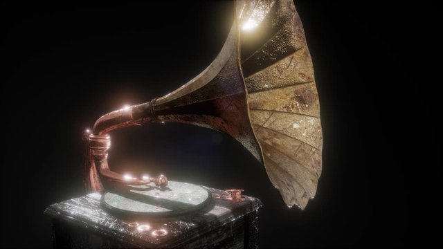 Vintage gramophone in dark with frairs. retro technology.