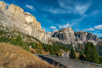 The winding road through the beautiful landscape at the Sella mountains pass