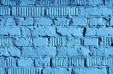 Old brick wall texture close up. Abstract background blue color toned