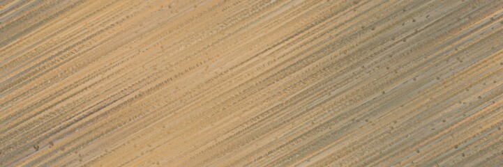 seamless repeating graphic with diagonal color lines background rosy brown, pastel brown and burly wood colors