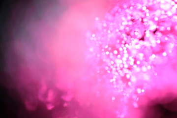 colorful glowing lights and light dots with bokeh close-up