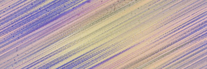 seamless repeating background graphic with diagonal color lines background dark gray, tan and slate gray colors