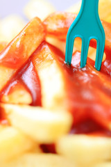 fries with ketchup and fork
