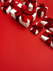Gift boxes with red ribbon bow.