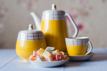 Oriental sweets Turkish delight, espresso, yellow vintage coffee or tea set