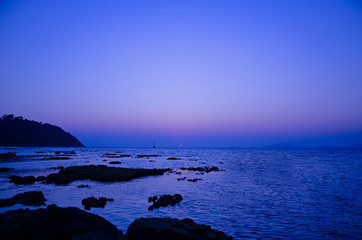 Beautiful Koh Lipe Island Sunset in Thailand Lonely boats white sand beaches as the sun goes down Paradise Island.