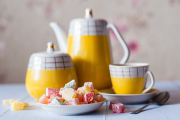 Oriental sweets Turkish delight, espresso, yellow vintage coffee or tea set