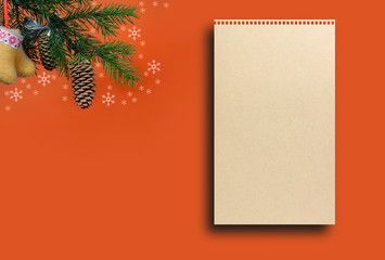 Orange background for a letter to Santa Claus. Background for a Christmas card. Decorated with fir cones, fir branches, snowflakes, Christmas toys.
