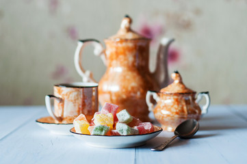Multicolored Turkish delight, oriental sweets, very beautiful, vintage, old coffee set and spoon