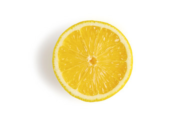 Cut lemon on isolated white background