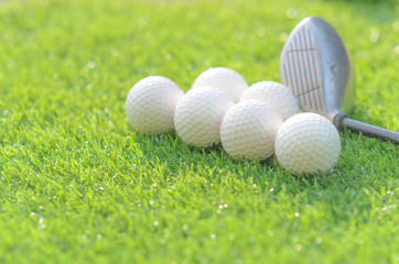 golf ball on green grass with copy space
