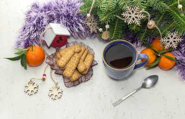 The tangerines, christmas cookies and a cup of herbal tea