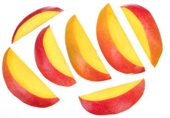 Set of mango slices isolated on white background. File contains clipping path.