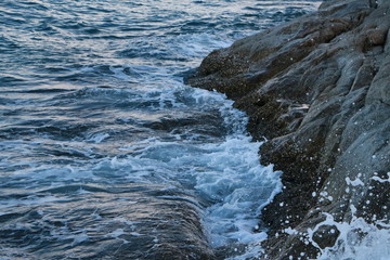 waves crashing on rocks