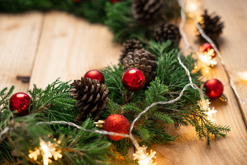 Christmas - Pine cones and branches  On the wood © artrachen