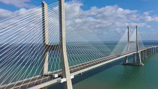 Lisbon sightseeing from above - The Vasco da Gama Bridge - aerial drone footage