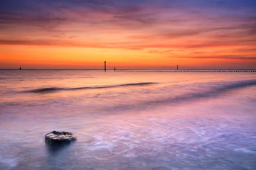 Foto auf Acrylglas Beach at sunset in Zeeland, The Netherlands © sara_winter