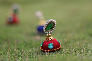 Hand made colorful Earring with blurred background
