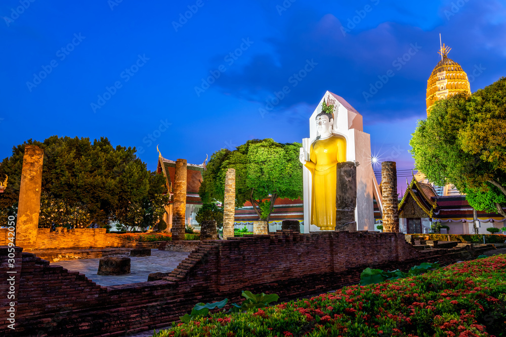 Wall mural buddha statue at sunset are buddhist temple at wat phra si rattana mahathat also colloquially referr