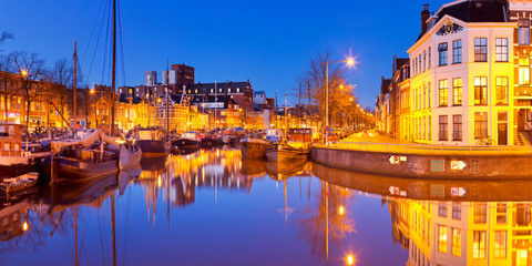 The city of Groningen, The Netherlands at night - obrazy, fototapety, plakaty