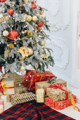 Christmas tree decorated with bright balls and garlands