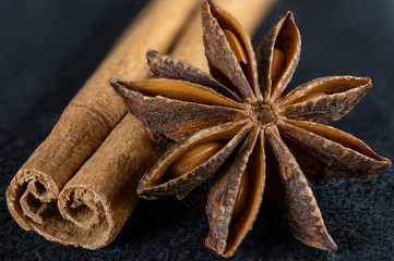 star anise and cinnamon on black alcantara