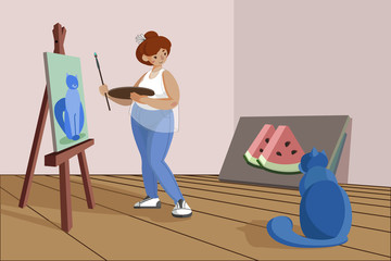 Fototapeta premium The girl paints a picture on canvas, standing at the easel. An artist with a palette and a brush in his hands. Body positive girl draws a cat in an art studio.
