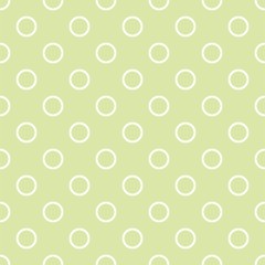 Seamless vector pattern with polka dots on fresh grass green background