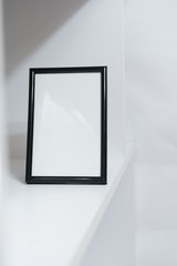 Black frame with blank space in white interior 
