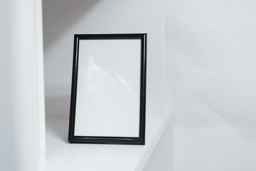 Black frame with blank space in white interior 