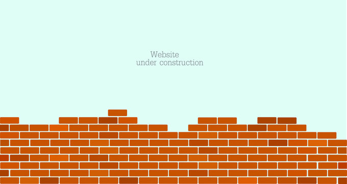 Website is under construction text and brick background.