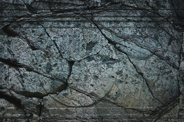 Texture of stone with cracks.  Background free space. Top view. Free space