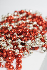 Christmas decoration, red and white beads background