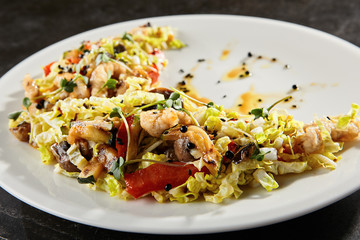 Chinese cabbage salad on white plate